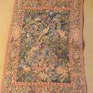 Blue and rust colored wall tapestry